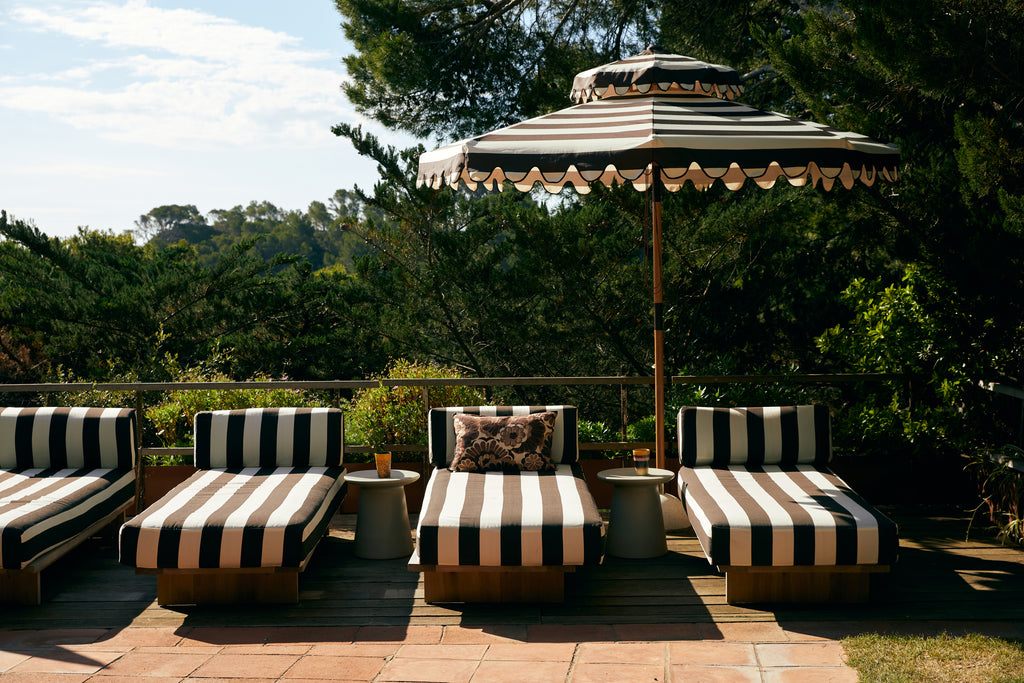 Striped patio umbrella stracciatella