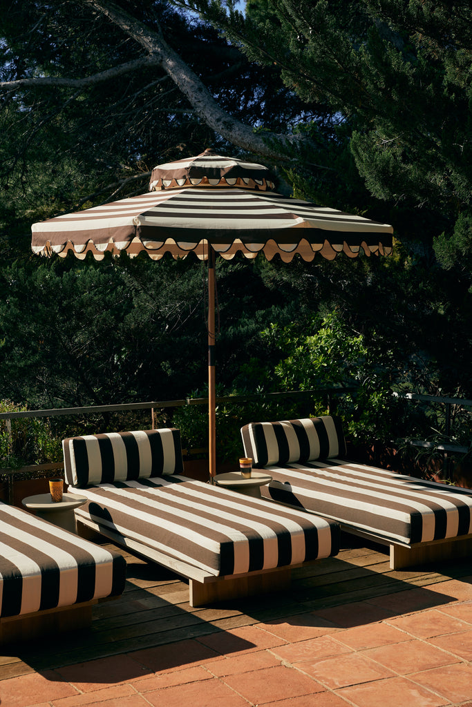 Striped patio umbrella stracciatella