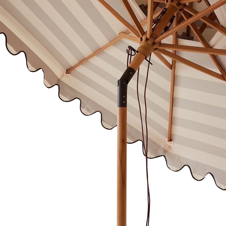 Striped patio umbrella stracciatella